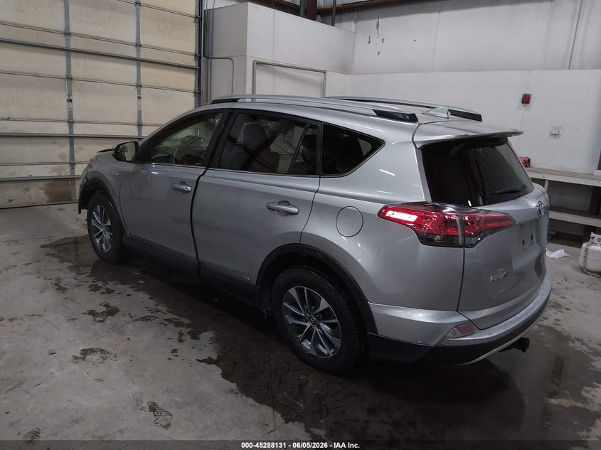 2018 Toyota Rav 4 VIN JTMRJREV0JD180961 IAAI salvage auction — SIDE, Salvage Title, sold $2,600 on 2026-07-24 (photo 3)