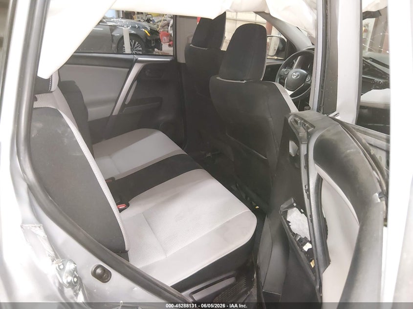2018 Toyota Rav 4 VIN JTMRJREV0JD180961 IAAI salvage auction — SIDE, Salvage Title, sold $2,600 on 2026-07-24 (photo 8)