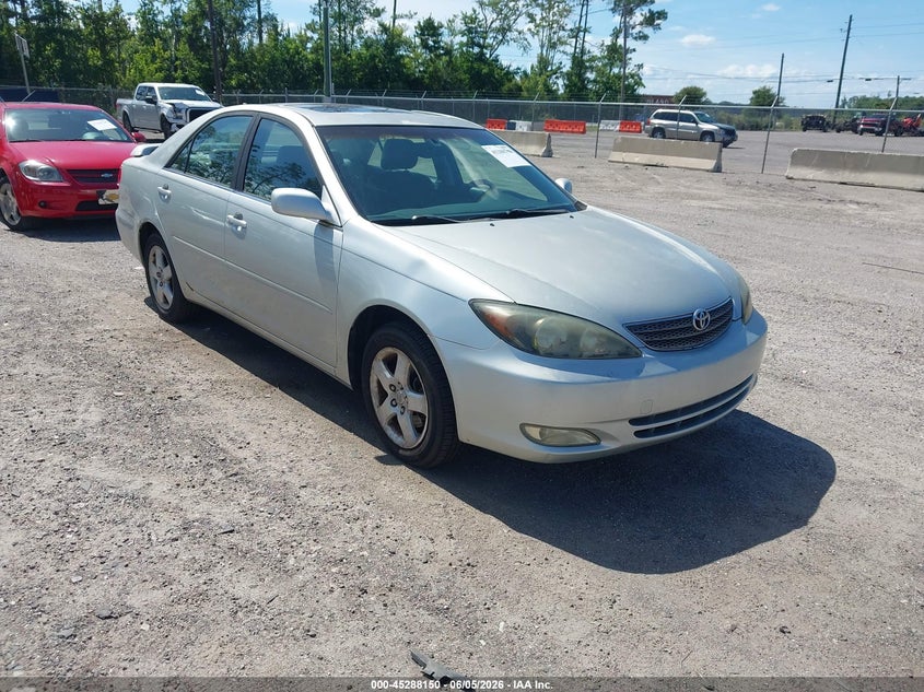 2002 Toyota Camry VIN JTDBF30K220082682 IAAI salvage auction — NORMAL WEAR, Clear (Florida), sold $400 on 2026-07-14 (photo 1)
