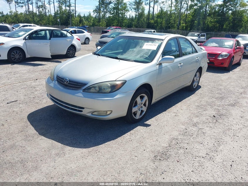2002 Toyota Camry VIN JTDBF30K220082682 IAAI salvage auction — NORMAL WEAR, Clear (Florida), sold $400 on 2026-07-14 (photo 2)