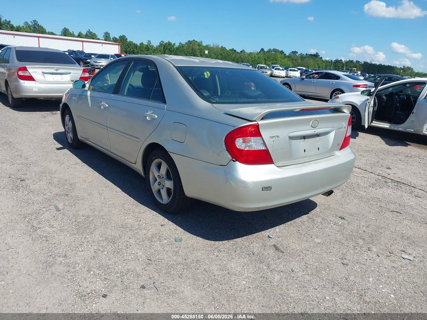 2002 Toyota Camry VIN JTDBF30K220082682 IAAI salvage auction — NORMAL WEAR, Clear (Florida), sold $400 on 2026-07-14 (photo 3)