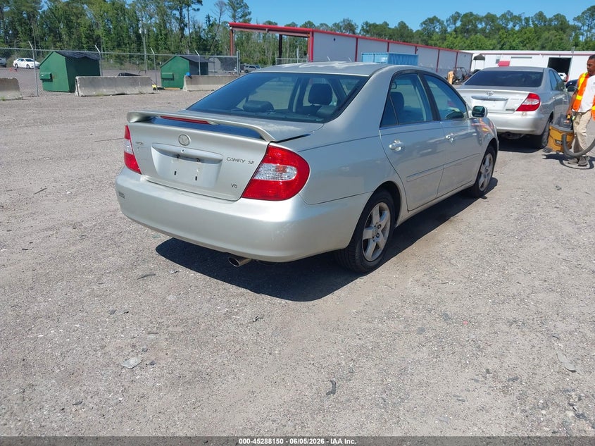 2002 Toyota Camry VIN JTDBF30K220082682 IAAI salvage auction — NORMAL WEAR, Clear (Florida), sold $400 on 2026-07-14 (photo 4)