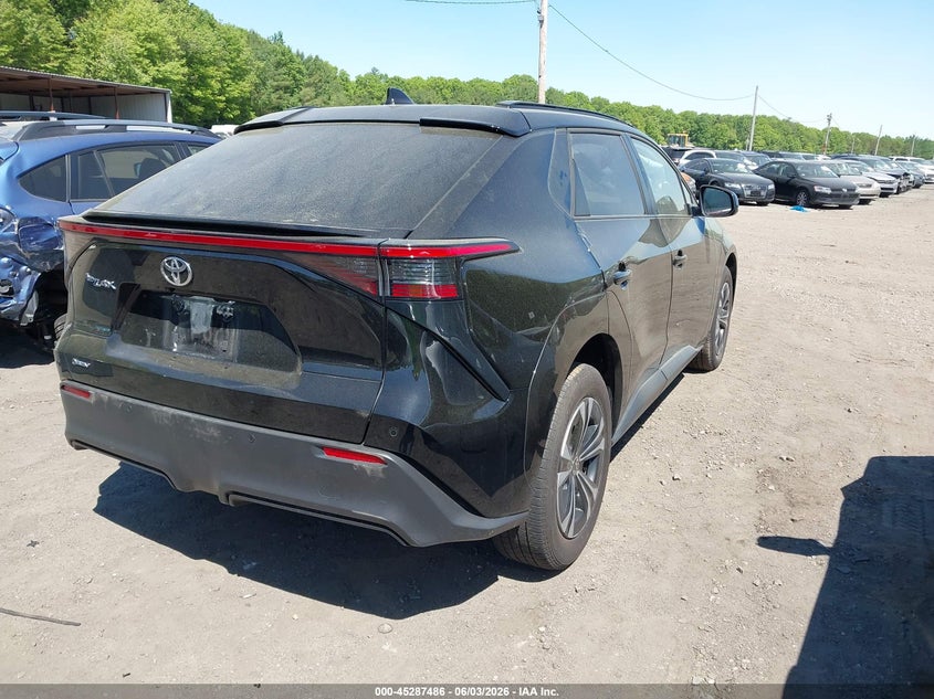 2025 Toyota Bz4x VIN JTMAAAAAXSA073369 IAAI salvage auction — LEFT SIDE, Salvage Title, sold $10,150 on 2026-08-13 (photo 4)