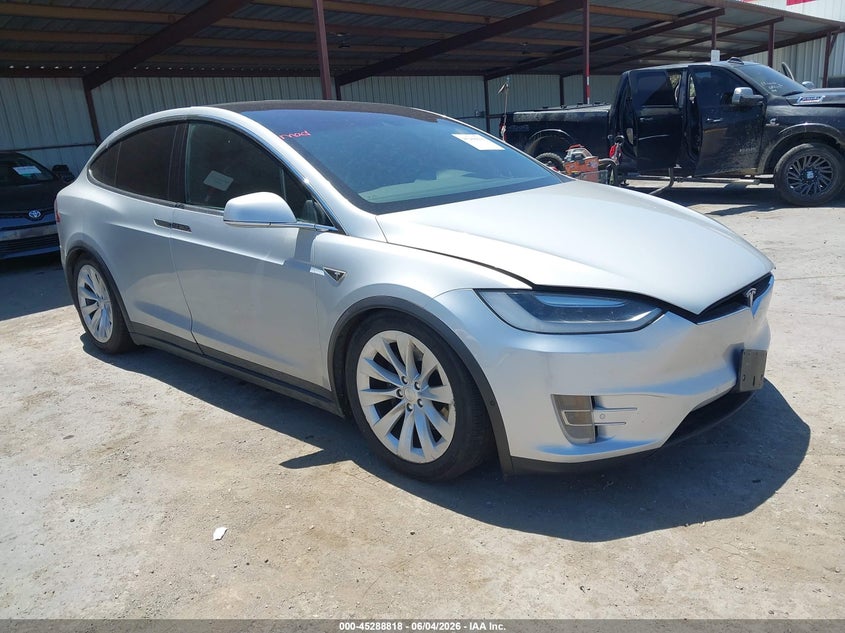 2016 Tesla Model x VIN 5YJXCAE23GF005081 IAAI salvage auction — LEFT FRONT, Salvage Title, sold $5,600 on 2026-07-16 (photo 1)