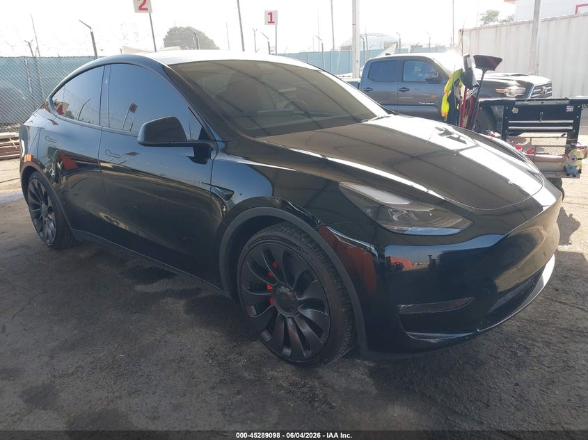 2023 Tesla Model y VIN 7SAYGDEF9PF925202 IAAI salvage auction — REAR END, Salvage Title, sold $14,100 on 2026-07-26 (photo 1)