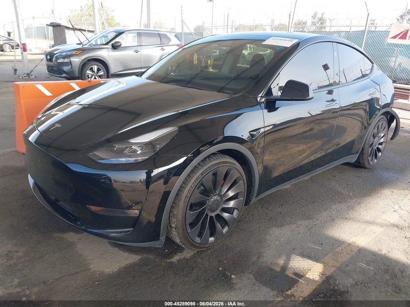2023 Tesla Model y VIN 7SAYGDEF9PF925202 IAAI salvage auction — REAR END, Salvage Title, sold $14,100 on 2026-07-26 (photo 2)
