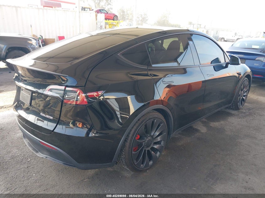 2023 Tesla Model y VIN 7SAYGDEF9PF925202 IAAI salvage auction — REAR END, Salvage Title, sold $14,100 on 2026-07-26 (photo 4)