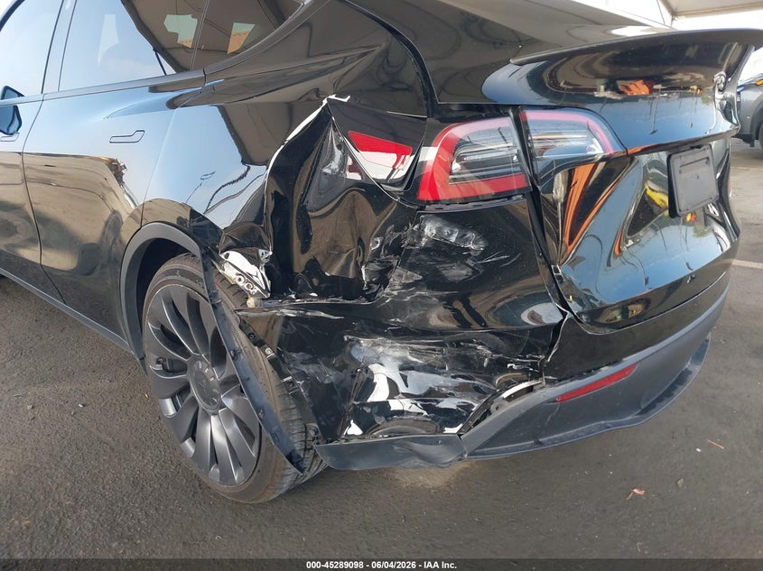 2023 Tesla Model y VIN 7SAYGDEF9PF925202 IAAI salvage auction — REAR END, Salvage Title, sold $14,100 on 2026-07-26 (photo 6)
