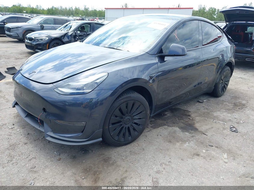 2024 Tesla Model y VIN 7SAYGDEE6RA313868 IAAI salvage auction — REAR END, Rebuildable (Florida), sold $18,100 on 2026-07-31 (photo 2)