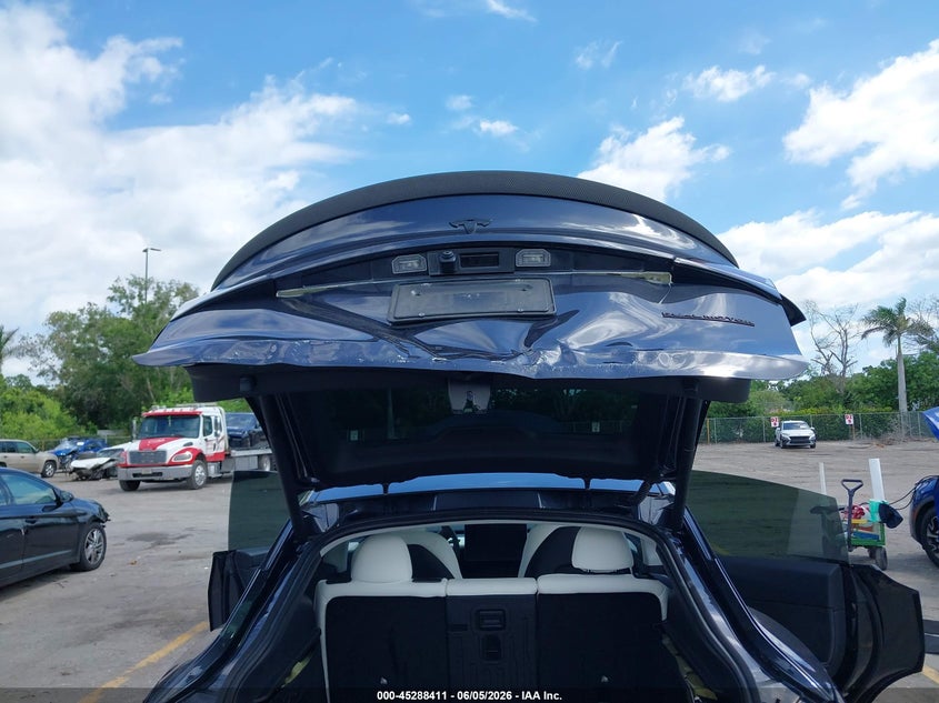 2024 Tesla Model y VIN 7SAYGDEE6RA313868 IAAI salvage auction — REAR END, Rebuildable (Florida), sold $18,100 on 2026-07-31 (photo 6)
