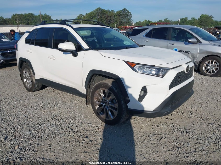 2020 Toyota Rav 4 VIN JTMW1RFV2LD052628 IAAI salvage auction — SIDE, Salvage Title, sold $7,000 on 2026-07-17 (photo 1)