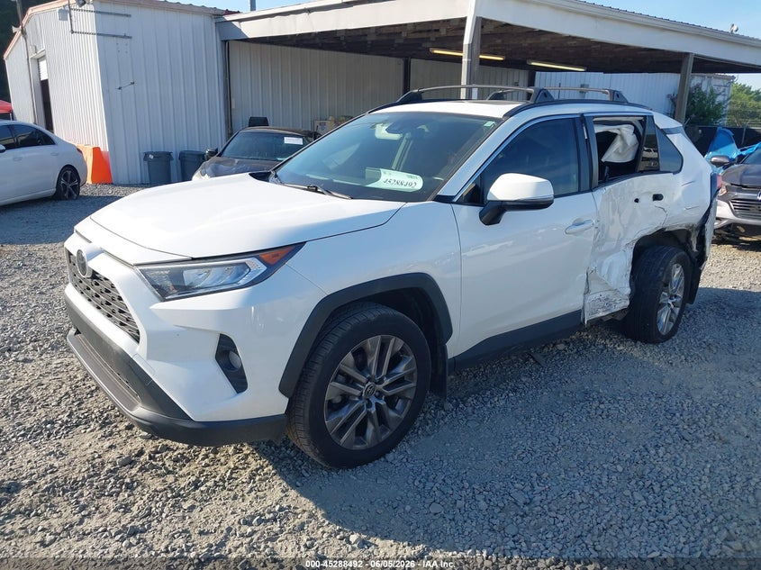 2020 Toyota Rav 4 VIN JTMW1RFV2LD052628 IAAI salvage auction — SIDE, Salvage Title, sold $7,000 on 2026-07-17 (photo 2)