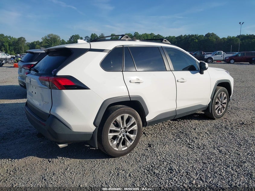 2020 Toyota Rav 4 VIN JTMW1RFV2LD052628 IAAI salvage auction — SIDE, Salvage Title, sold $7,000 on 2026-07-17 (photo 4)