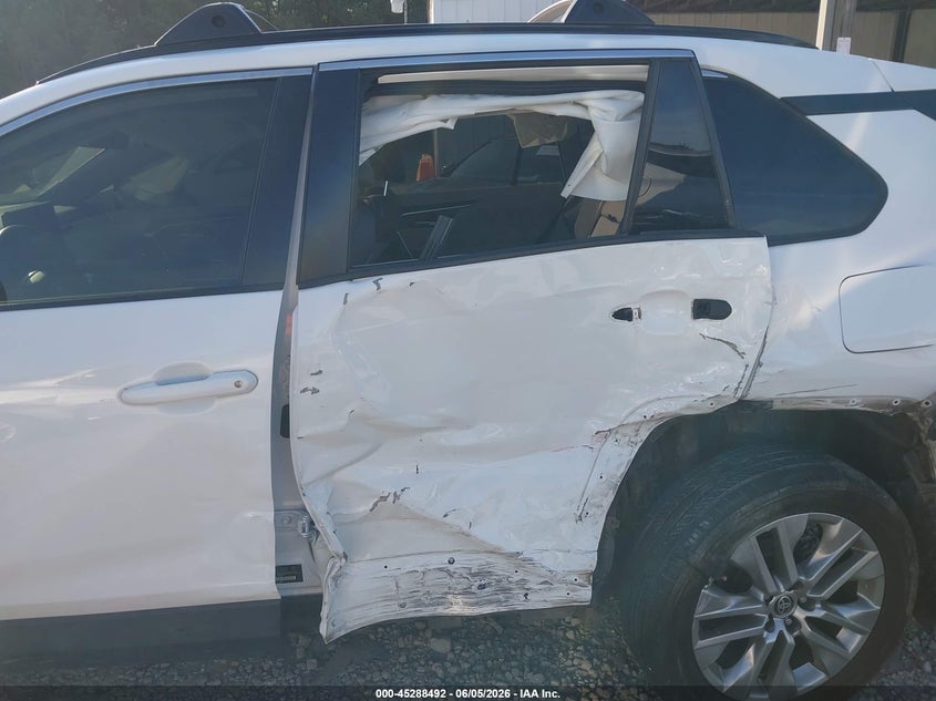 2020 Toyota Rav 4 VIN JTMW1RFV2LD052628 IAAI salvage auction — SIDE, Salvage Title, sold $7,000 on 2026-07-17 (photo 6)