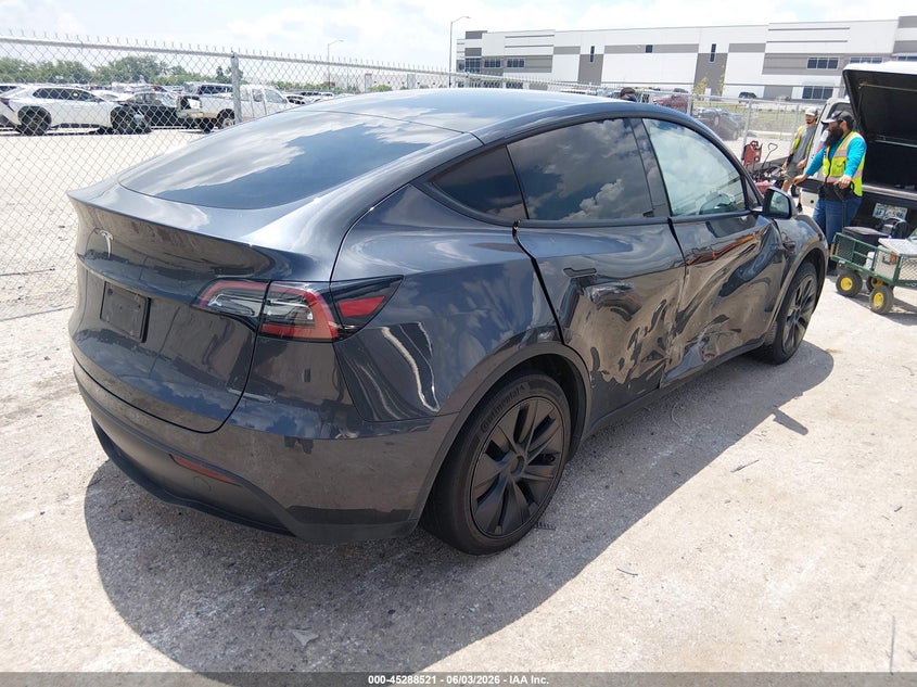 2025 Tesla Model y VIN 7SAYGDED7SA347251 IAAI salvage auction — SIDE, Salvage Title, sold $10,500 on 2026-08-02 (photo 4)