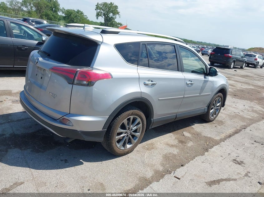 2018 Toyota Rav 4 VIN JTMDFREVXJJ203675 IAAI salvage auction — HAIL, Salvage Title, sold $11,400 on 2026-07-14 (photo 4)