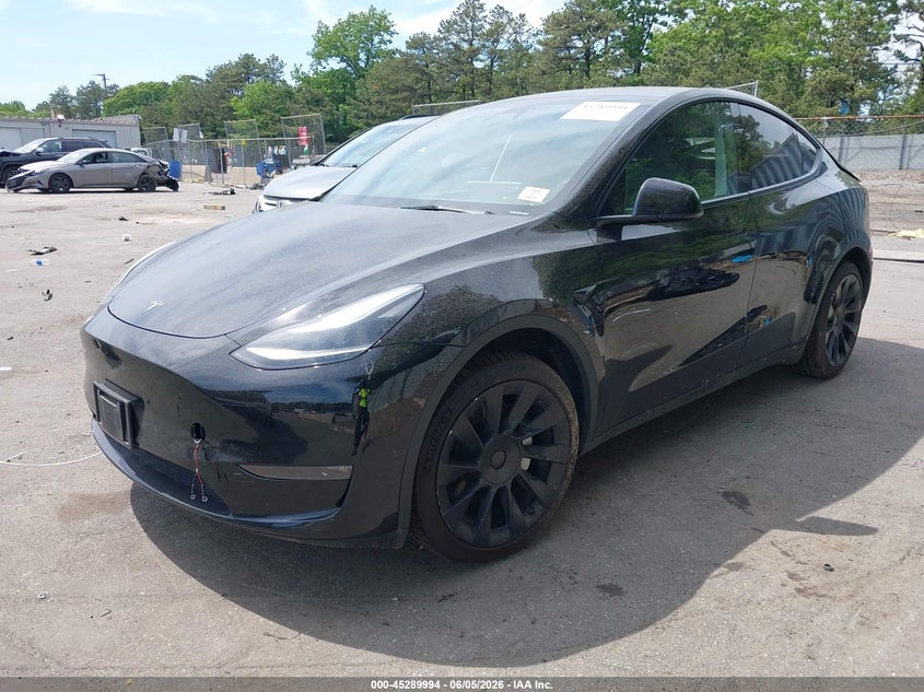 2023 Tesla Model y VIN 7SAYGDEE6PA182986 IAAI salvage auction — REAR END, Mv-907A (New York), sold $7,100 on 2026-07-28 (photo 2)