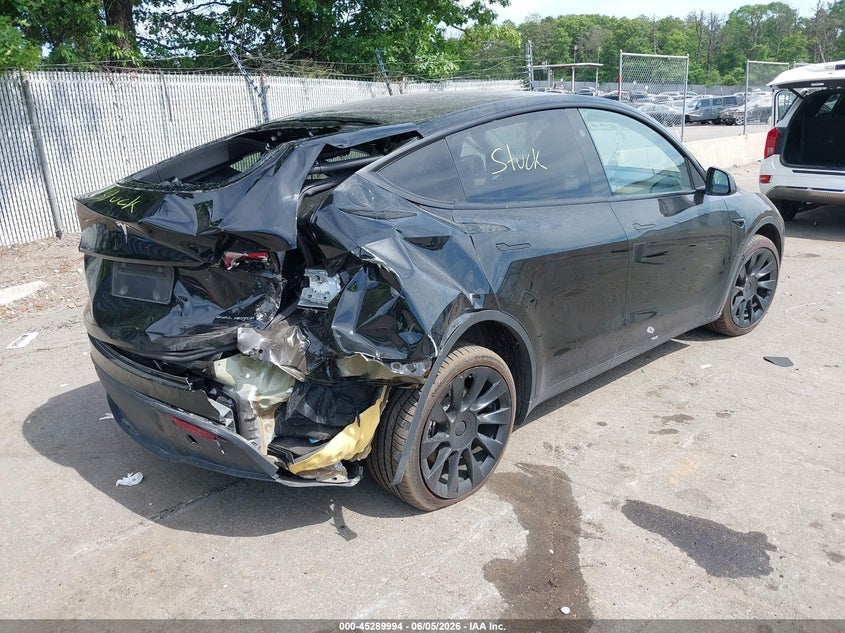 2023 Tesla Model y VIN 7SAYGDEE6PA182986 IAAI salvage auction — REAR END, Mv-907A (New York), sold $7,100 on 2026-07-28 (photo 4)