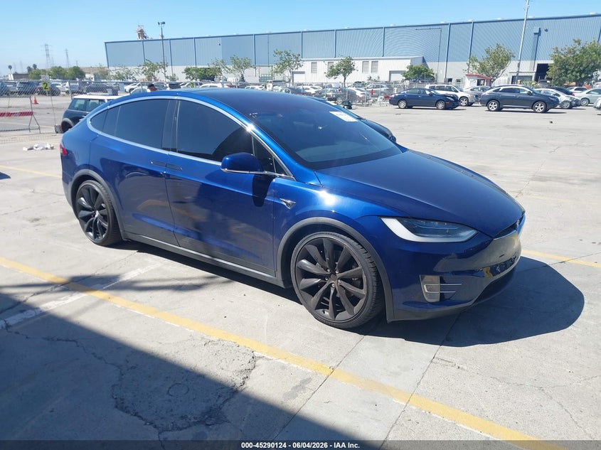 2018 Tesla Model x VIN 5YJXCBE21JF128634 — IAAI salvage auction photo