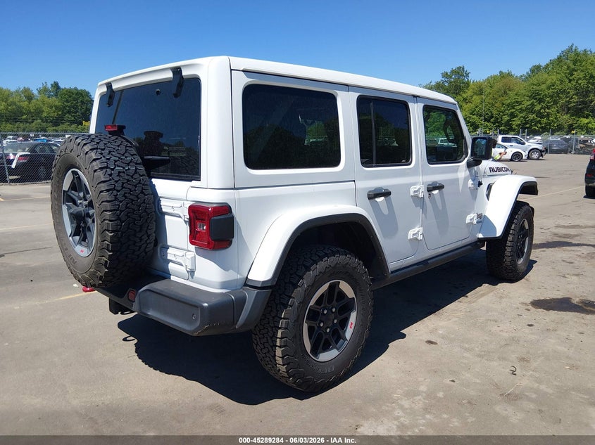 2021 Jeep Wrangler / VIN 1C4HJXFN1MW698083 IAAI salvage auction — LEFT SIDE, Salvage Title, sold $15,050 on 2026-08-27 (photo 4)