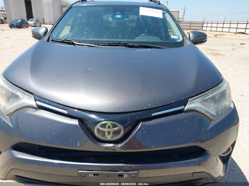 2017 Toyota Rav 4 VIN JTMWFREV8HJ103688 IAAI salvage auction — HAIL, Salvage Title, sold $4,550 on 2026-07-16 (photo 6)