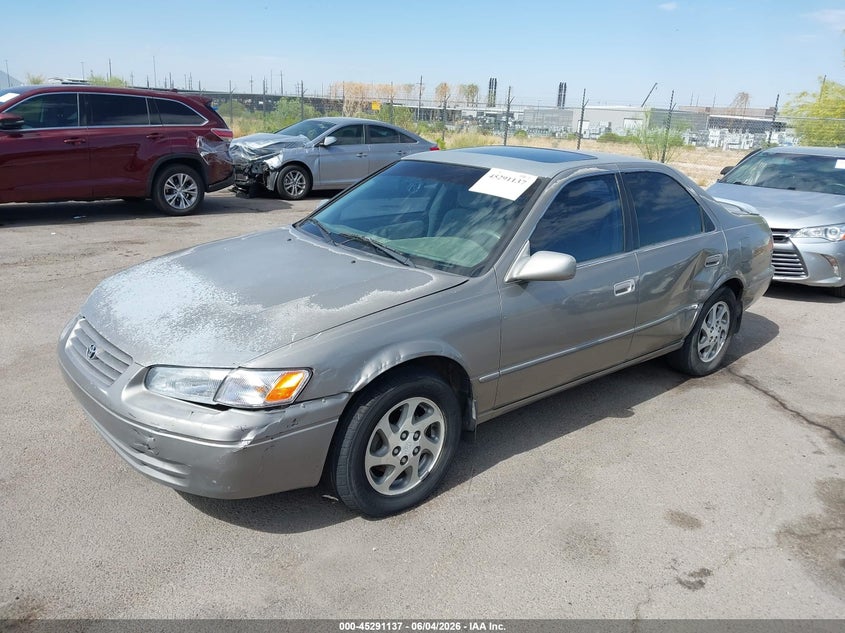 1997 Toyota Camry VIN 4T1BF22K4VU040336 IAAI salvage auction — LEFT SIDE, Salvage (Arizona), sold $275 on 2026-07-09 (photo 2)