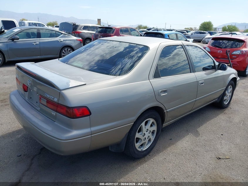 1997 Toyota Camry VIN 4T1BF22K4VU040336 IAAI salvage auction — LEFT SIDE, Salvage (Arizona), sold $275 on 2026-07-09 (photo 4)
