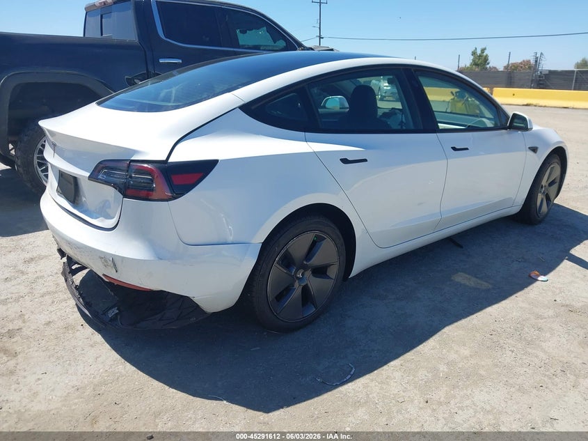 2023 Tesla Model 3 VIN 5YJ3E1EA3PF400216 IAAI salvage auction — REAR END, Salvage Title, sold $8,800 on 2026-07-16 (photo 4)