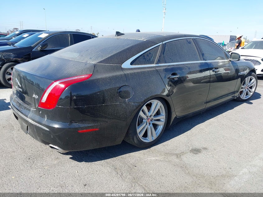 2014 Jaguar Xj VIN SAJWA2GZ6E8V59179 IAAI salvage auction — NORMAL WEAR, Salvage Title, sold $1,100 on 2026-07-23 (photo 4)