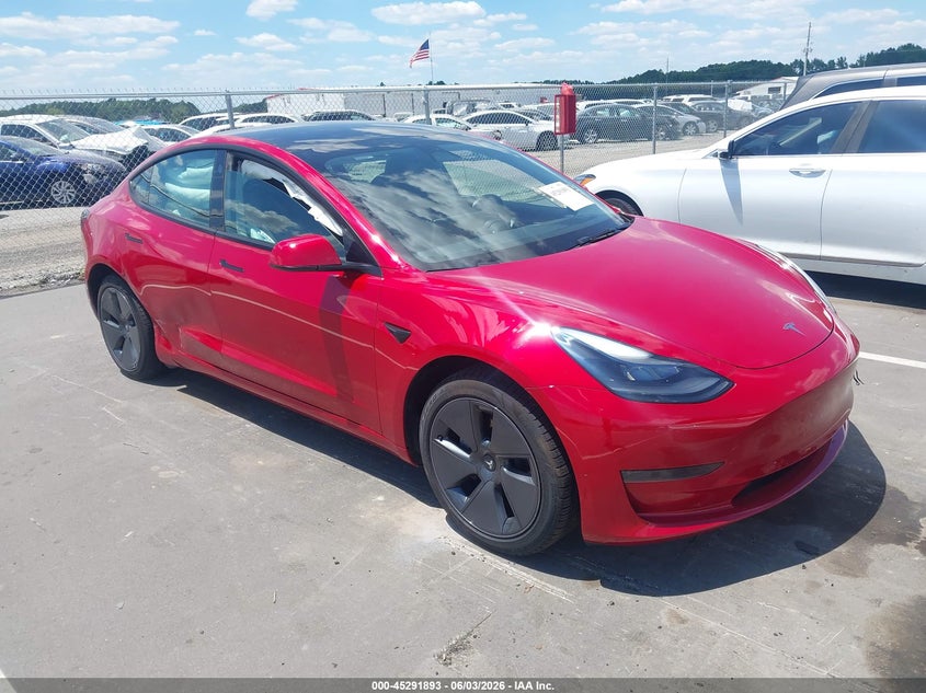 2023 Tesla Model 3 VIN 5YJ3E1EA8PF641592 IAAI salvage auction — SIDE, Salvage Title, sold $7,400 on 2026-07-11 (photo 1)