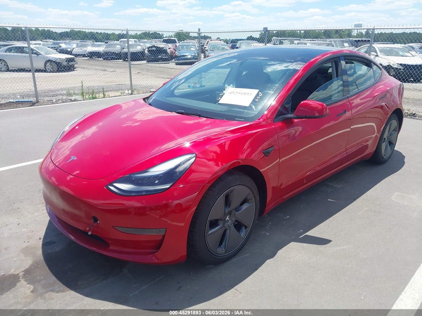 2023 Tesla Model 3 VIN 5YJ3E1EA8PF641592 IAAI salvage auction — SIDE, Salvage Title, sold $7,400 on 2026-07-11 (photo 2)