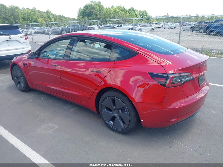 2023 Tesla Model 3 VIN 5YJ3E1EA8PF641592 IAAI salvage auction — SIDE, Salvage Title, sold $7,400 on 2026-07-11 (photo 3)