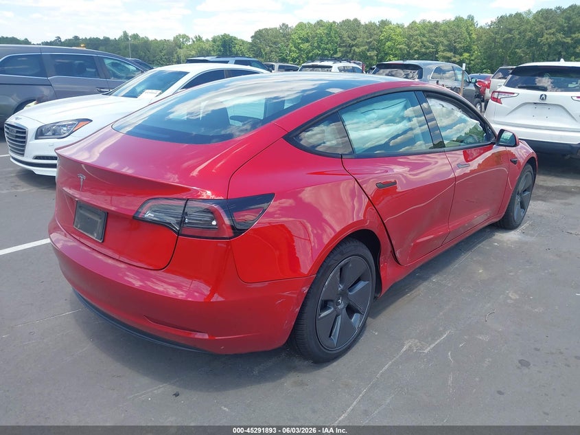 2023 Tesla Model 3 VIN 5YJ3E1EA8PF641592 IAAI salvage auction — SIDE, Salvage Title, sold $7,400 on 2026-07-11 (photo 4)