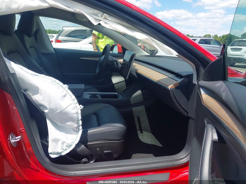 2023 Tesla Model 3 VIN 5YJ3E1EA8PF641592 IAAI salvage auction — SIDE, Salvage Title, sold $7,400 on 2026-07-11 (photo 5)