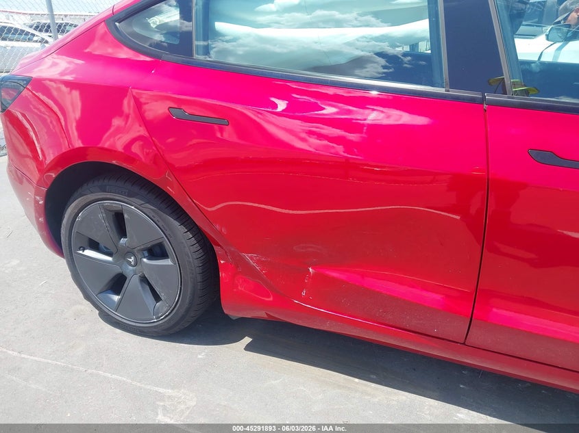 2023 Tesla Model 3 VIN 5YJ3E1EA8PF641592 IAAI salvage auction — SIDE, Salvage Title, sold $7,400 on 2026-07-11 (photo 6)