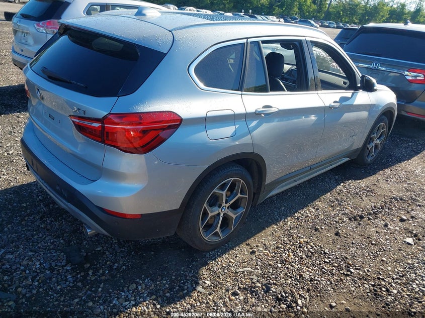 2017 BMW X1 VIN WBXHT3C39H5F69483 IAAI salvage auction — LEFT SIDE, Mv-907A (New York), sold $1,750 on 2026-07-28 (photo 4)