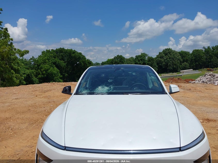 2026 Tesla Model y VIN 7SAYGDED9TF423234 IAAI salvage auction — HAIL, Salvage Title, sold $22,950 on 2026-07-16 (photo 6)
