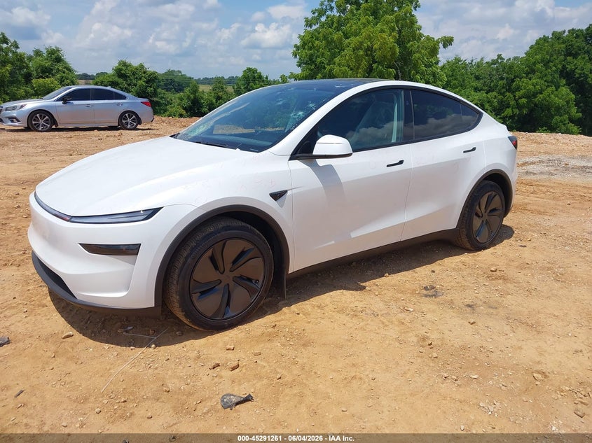 2026 Tesla Model y VIN 7SAYGDED9TF423234 IAAI salvage auction — HAIL, Salvage Title, sold $22,950 on 2026-07-16 (photo 2)