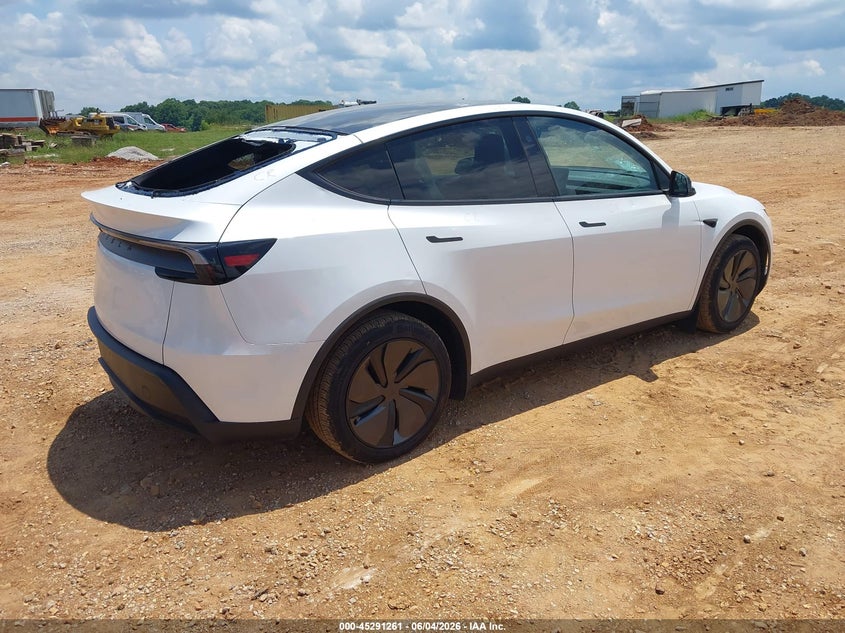 2026 Tesla Model y VIN 7SAYGDED9TF423234 IAAI salvage auction — HAIL, Salvage Title, sold $22,950 on 2026-07-16 (photo 4)