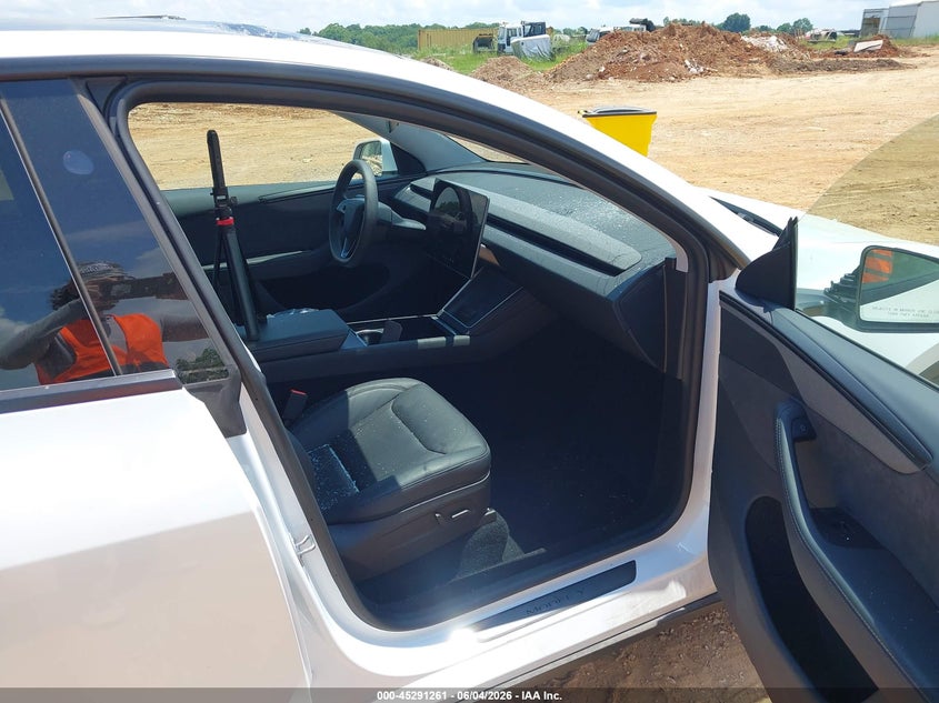 2026 Tesla Model y VIN 7SAYGDED9TF423234 IAAI salvage auction — HAIL, Salvage Title, sold $22,950 on 2026-07-16 (photo 5)