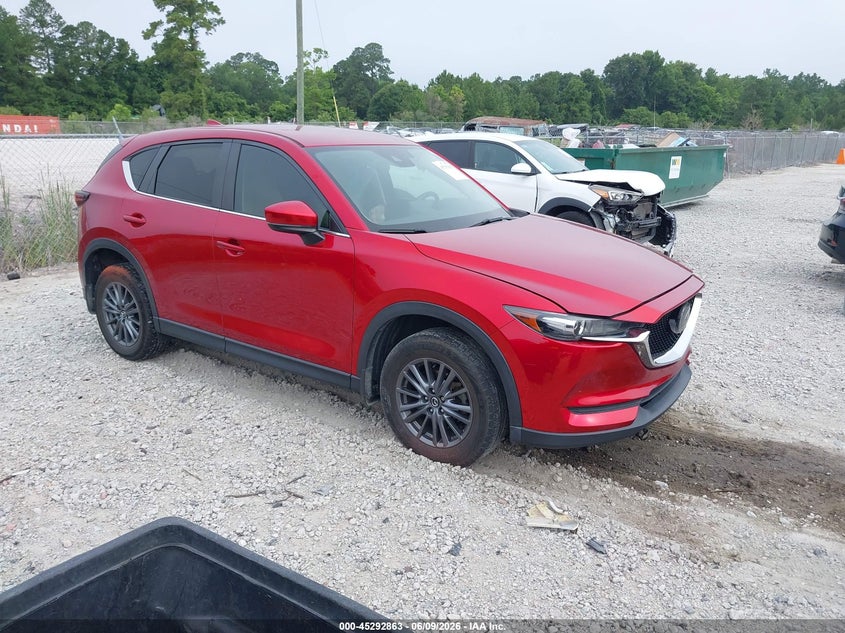 2021 Mazda Cx-5 VIN JM3KFACM8M0355457 IAAI salvage auction — LEFT SIDE, Salvage Title, sold $4,000 on 2026-07-21 (photo 1)