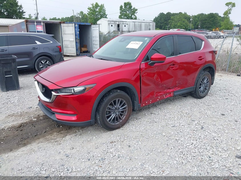 2021 Mazda Cx-5 VIN JM3KFACM8M0355457 IAAI salvage auction — LEFT SIDE, Salvage Title, sold $4,000 on 2026-07-21 (photo 2)