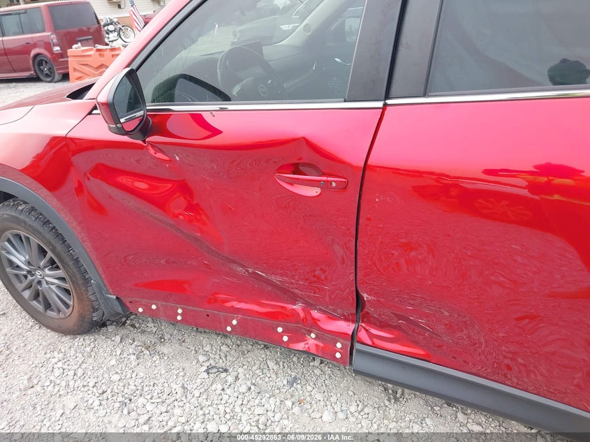 2021 Mazda Cx-5 VIN JM3KFACM8M0355457 IAAI salvage auction — LEFT SIDE, Salvage Title, sold $4,000 on 2026-07-21 (photo 6)