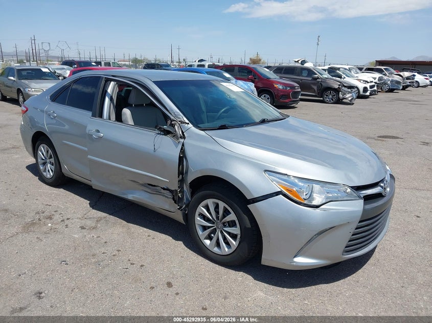 2017 Toyota Camry VIN 4T1BF1FK5HU329704 IAAI salvage auction — SIDE, Salvage Title, sold $5,000 on 2026-07-09 (photo 1)