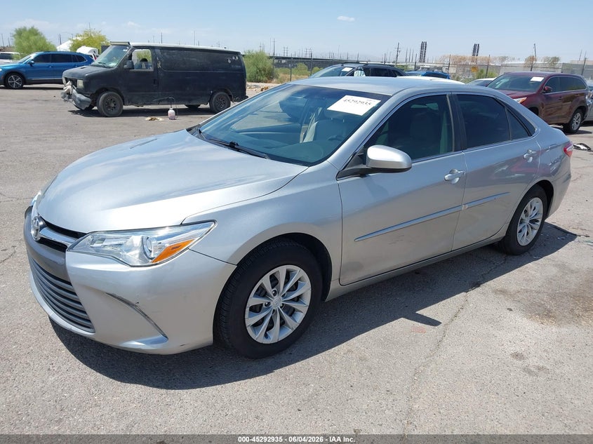 2017 Toyota Camry VIN 4T1BF1FK5HU329704 IAAI salvage auction — SIDE, Salvage Title, sold $5,000 on 2026-07-09 (photo 2)