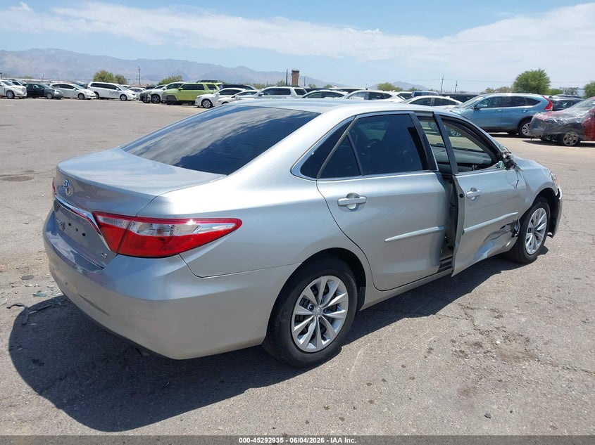 2017 Toyota Camry VIN 4T1BF1FK5HU329704 IAAI salvage auction — SIDE, Salvage Title, sold $5,000 on 2026-07-09 (photo 4)