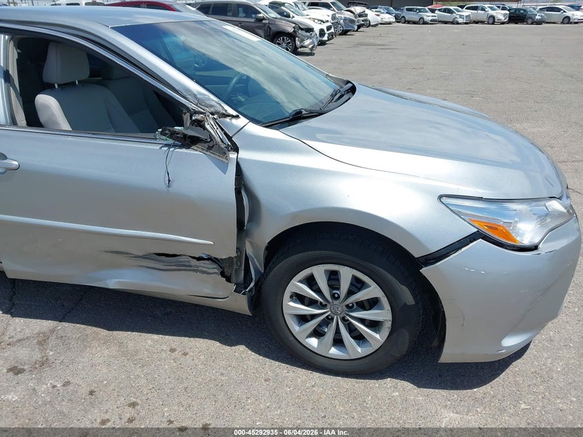 2017 Toyota Camry VIN 4T1BF1FK5HU329704 IAAI salvage auction — SIDE, Salvage Title, sold $5,000 on 2026-07-09 (photo 6)