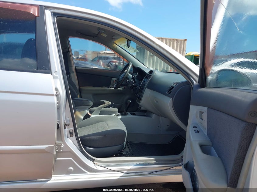 2006 Kia Spectra VIN KNAFE161765364121 IAAI salvage auction — NORMAL WEAR, Clear (Hawaii), sold $100 on 2026-07-28 (photo 5)