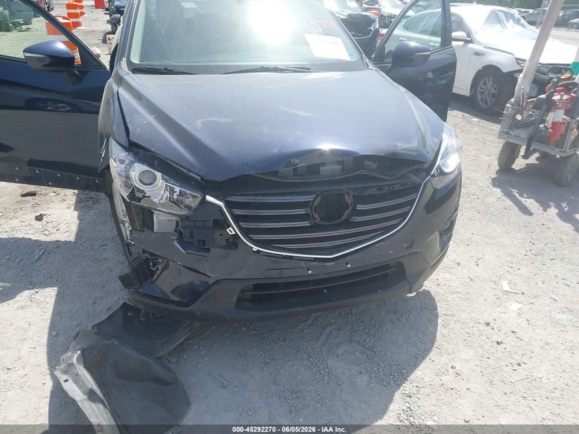 2016 Mazda Cx-5 VIN JM3KE4CY3G0869180 IAAI salvage auction — FRONT END, Salvage Title, sold $2,050 on 2026-07-21 (photo 6)