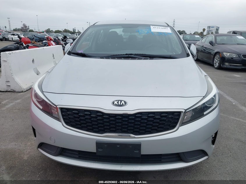 2018 Kia Forte VIN 3KPFK4A7XJE214283 IAAI salvage auction — NORMAL WEAR, Salvage Title, sold $525 on 2026-07-09 (photo 6)